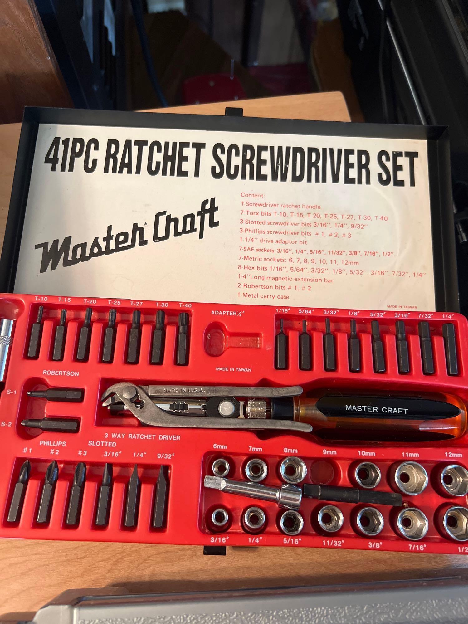 Lot of assorted tools, ratchet, screwdriver set, slot machine, hinge, sliding tool, Dremel, and
