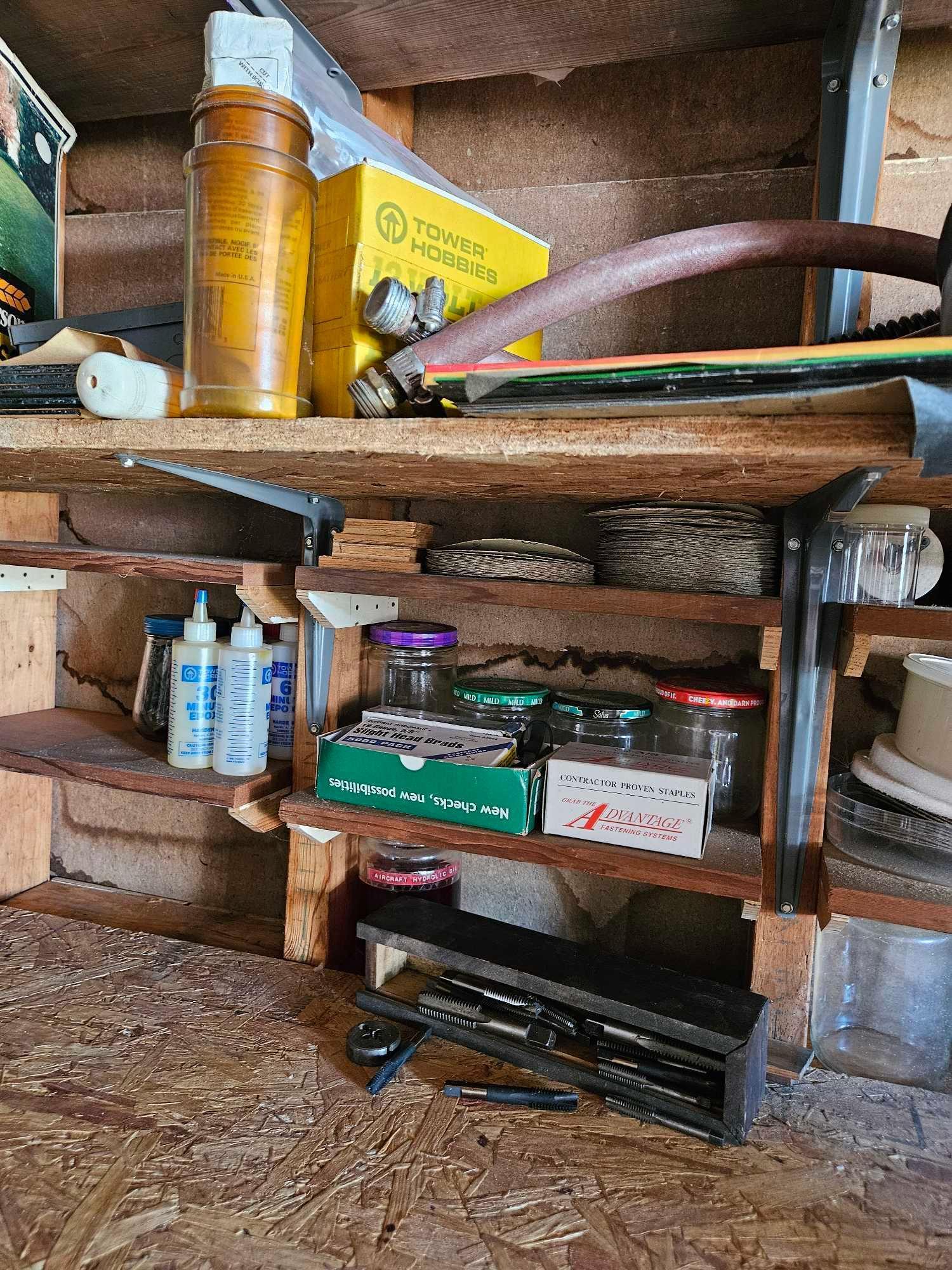 Contents of shelves on wall.