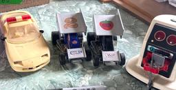 Collector Race cars, patrol car, and robot in kitchen