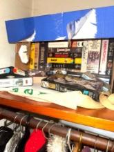 Contents of bedroom closet games clothes and more