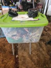 Tote of collector plates, folding seat and two cameras