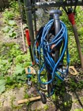 craftsman electric blower, extension cord, torch, limb trimmer and saws