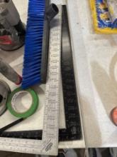 3- carpenters squares/broom no handle