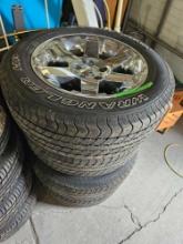 set of Goodyear M+S P275/60R20 tires with dodge ram wheels