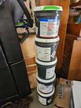 5 20 gallon buckets of flooring adhesive