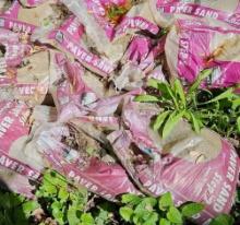 Approximately fifteen bags of paver sand