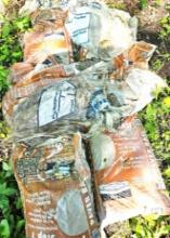 Approximately eight bags of paver, base