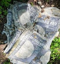 Approxed ten bags of drainage rock