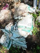 Approximately ten bags of topsoil