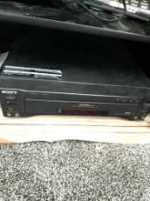 Cabinet with Sony laser disc system /rca dvd player