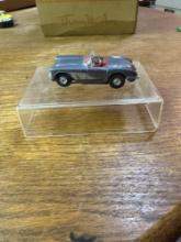 Silver Corvette model motoring slot