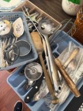 Lot of silverware and kitchen utensils
