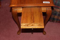 OAK END TABLE Q A FEET AND PULL OUT TRAY VERY NICE