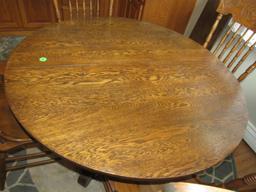 Round oak pedestal table