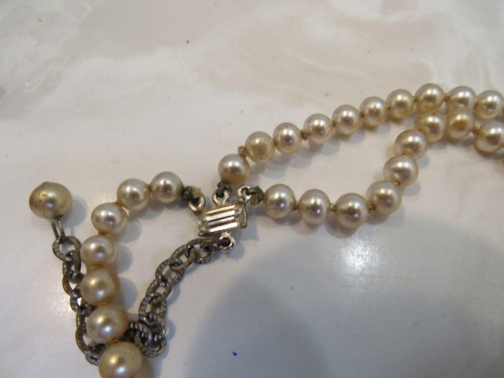 Pearl colored necklaces with earrings