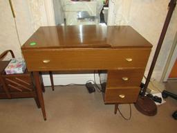 Singer sewing machine with cabinet