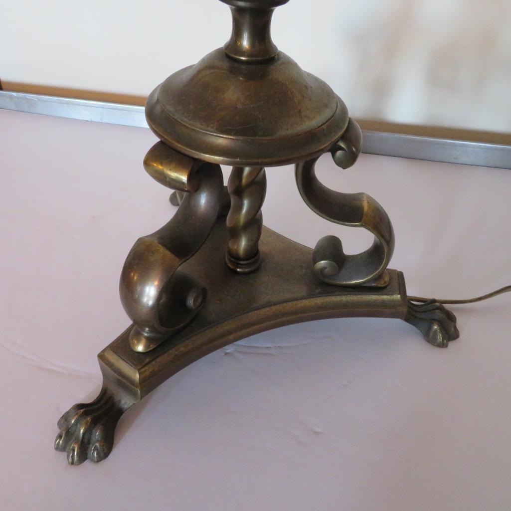 Ornate heavy brass floor lamp with twisted base and claw feet