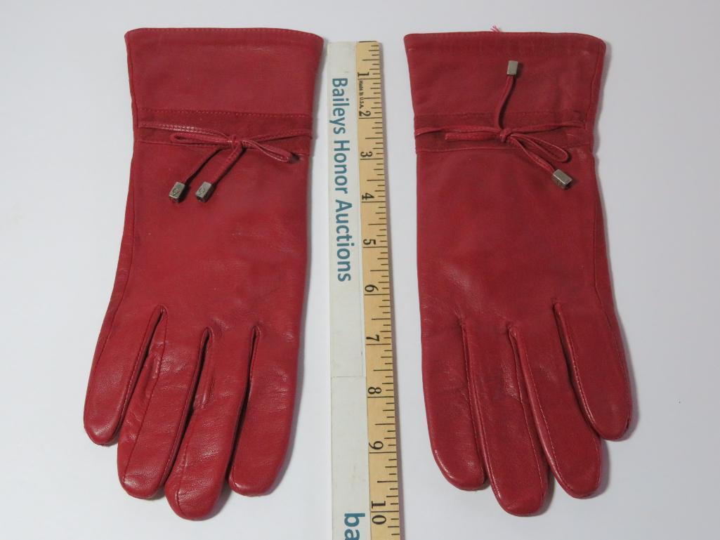 Two designer Suede purses and a pair of leather gloves