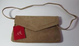 Two designer Suede purses and a pair of leather gloves