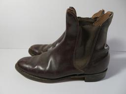 Riding boots, gloves and crop