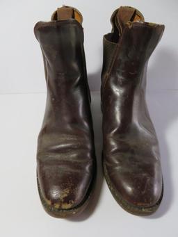 Riding boots, gloves and crop