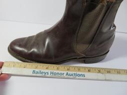 Riding boots, gloves and crop