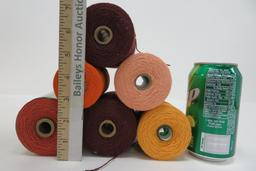 21 spools of Carpet Warp, Mayville, 4" tall, autumn colors