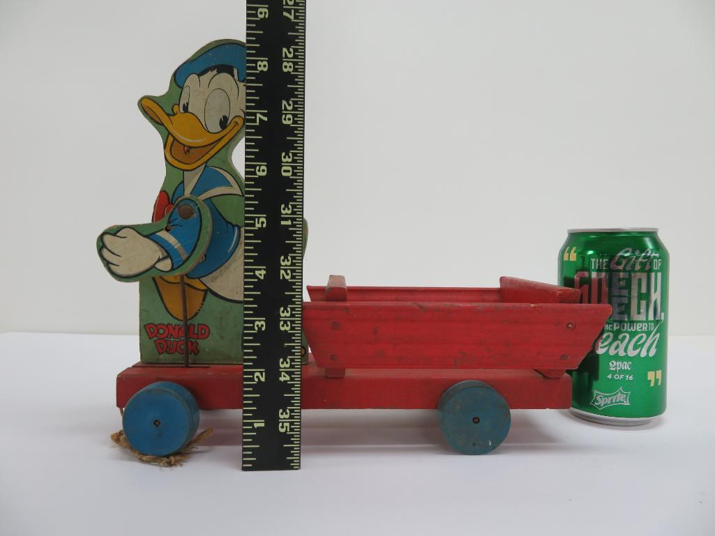 Vintage Fisher Price pull toy, Donald Duck Cart, 1951, 11"