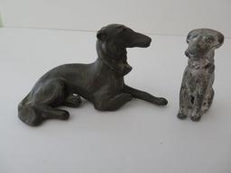 Two miniature metal dog paperweights