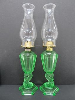 Pair of green vaseline glass dolphin base oil lamps, 10"