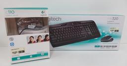 Still in boxes Logitech 320 wireless keyboard and mouse with C110 Webcam