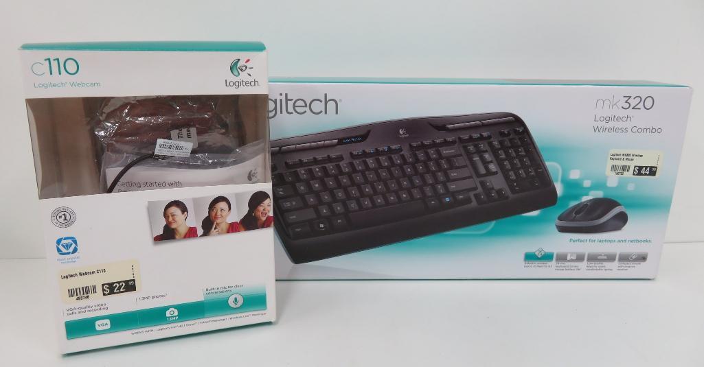 Still in boxes Logitech 320 wireless keyboard and mouse with C110 Webcam