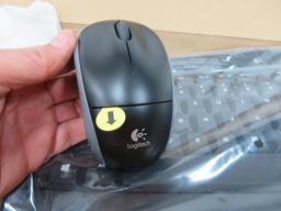 Still in boxes Logitech 320 wireless keyboard and mouse with C110 Webcam