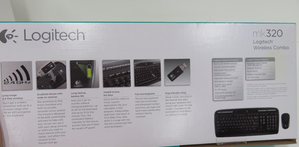 Still in boxes Logitech 320 wireless keyboard and mouse with C110 Webcam