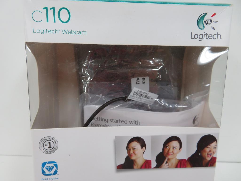 Still in boxes Logitech 320 wireless keyboard and mouse with C110 Webcam