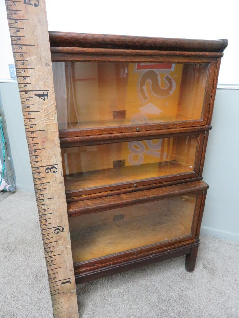 Three stack Globe Wernicke oak bookcase, step back sectional bookcase, 57"
