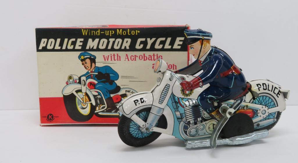 Japanese tin windup Police Motorcycle with acrobatic action, with box, working