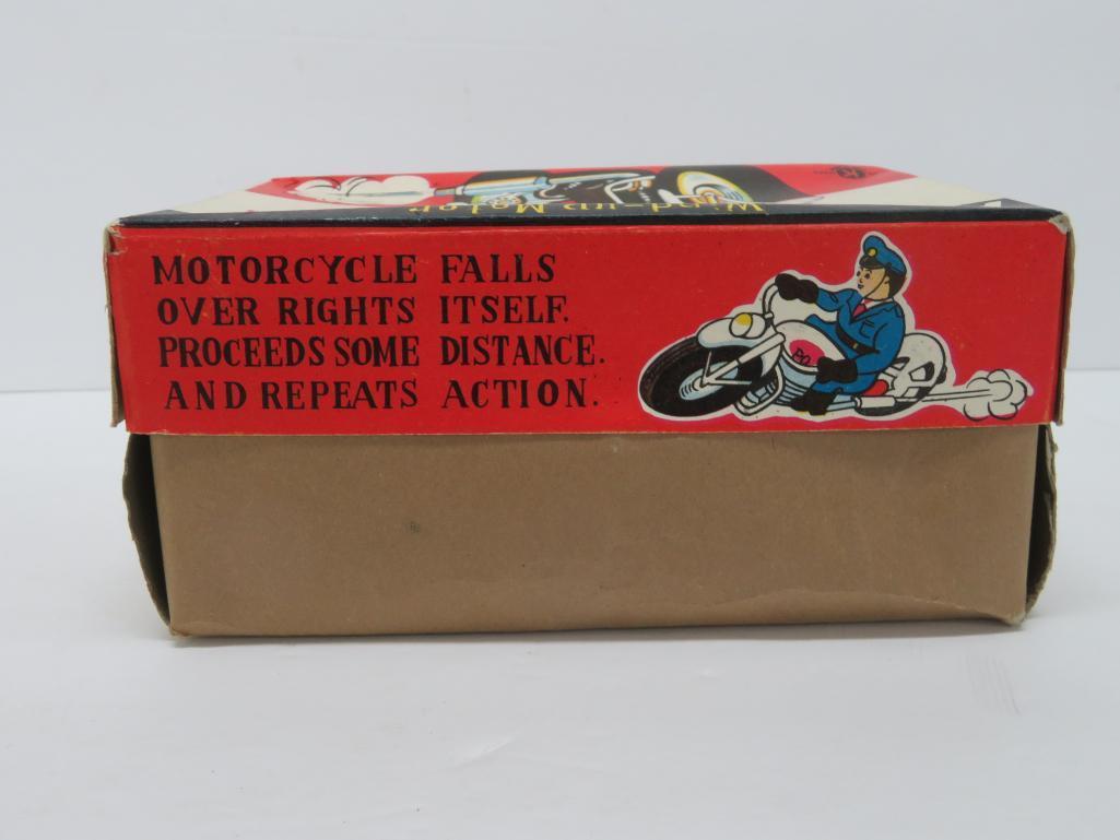 Japanese tin windup Police Motorcycle with acrobatic action, with box, working