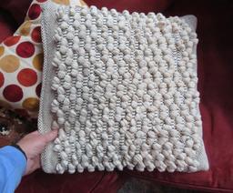 Four decorative accent pillows, 13" to 17"