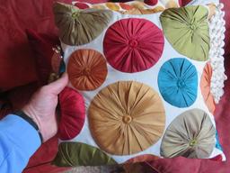 Four decorative accent pillows, 13" to 17"