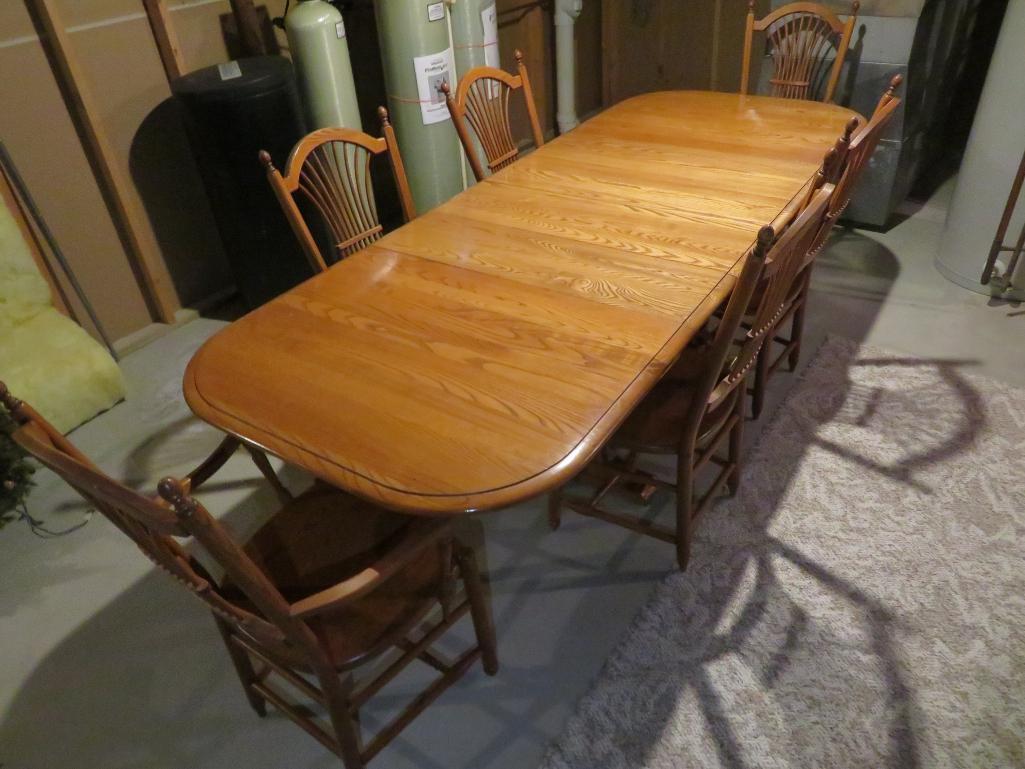 Large Table and Six Chairs, four leaves, honey oak color