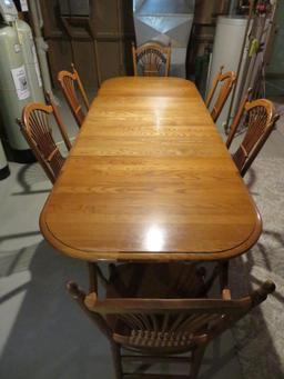 Large Table and Six Chairs, four leaves, honey oak color