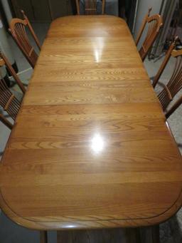 Large Table and Six Chairs, four leaves, honey oak color