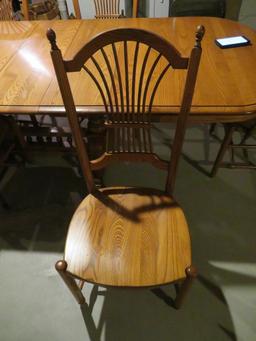 Large Table and Six Chairs, four leaves, honey oak color