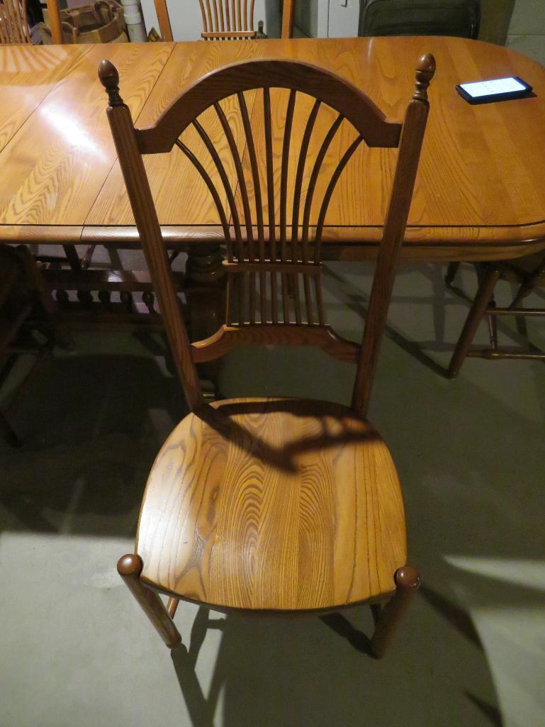 Large Table and Six Chairs, four leaves, honey oak color