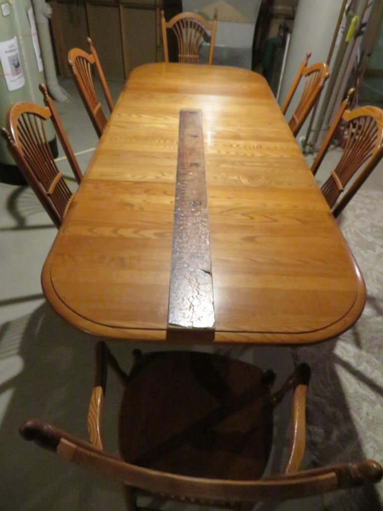 Large Table and Six Chairs, four leaves, honey oak color