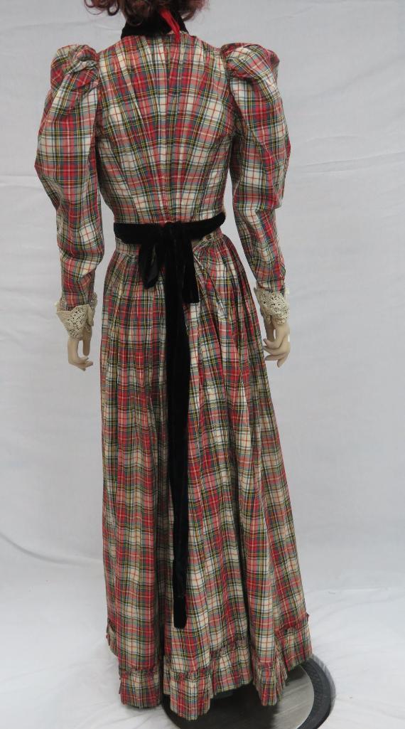 Two piece plaid outfit, skirt and top with lace and velvet embellishments, and hat