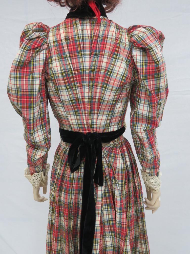 Two piece plaid outfit, skirt and top with lace and velvet embellishments, and hat