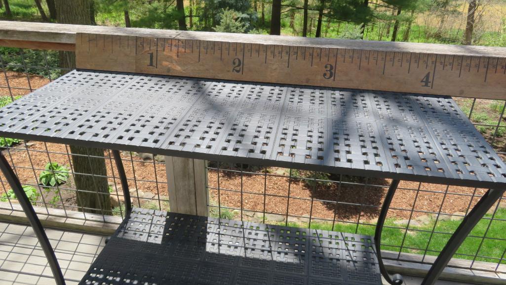 Heavy metal console table, about 50" long with shelf underneath, matches design of patio set
