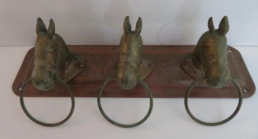 Three horse head metal hanger, 11"